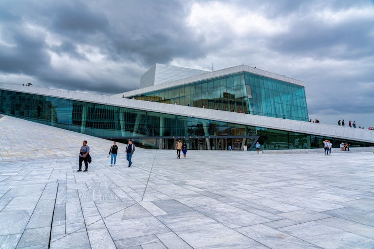 Explore the modern architecture of the Oslo Opera House in Norway, a landmark in urban design and culture.
